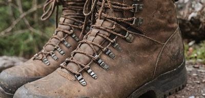 Restored hiking boots with new laces and conditioning